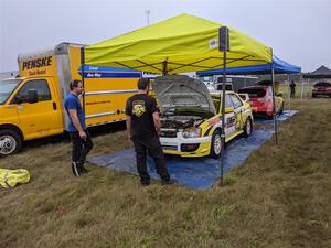 Mark Williams / Steve Harrell Subaru WRX and Scott Putnam / Spencer Putnam Subaru WRX STi prior to the start of day two stages.