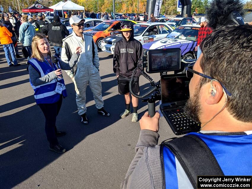 Kelsey Stephens and Calvin Cooper doing interviews at parc expose prior to the ceremonial start.