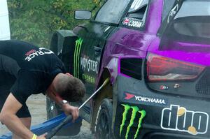 Liam Doran's Audi S1 is power-washed before the first practice.