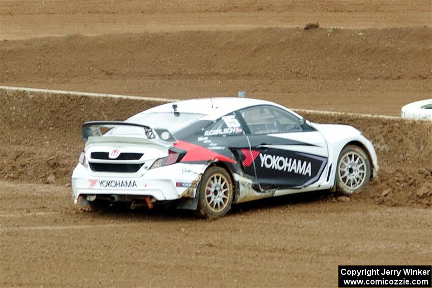 Andrew Carlson's Honda Civic slides off into the barrier.