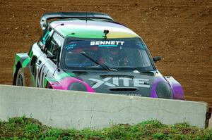 Oliver Bennett's MINI Cooper accidentally slides to a stop in turn one.