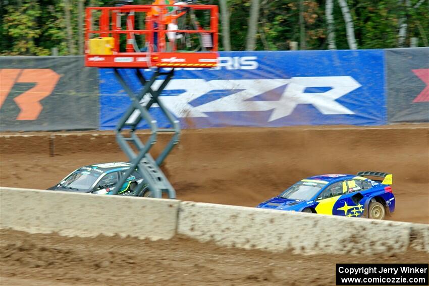 Steve Arpin's Hyundai i20 and Andreas Bakkerud's Subaru WRX STi