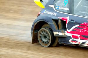 Kevin Hansen's Peugeot 208 loses a tire.