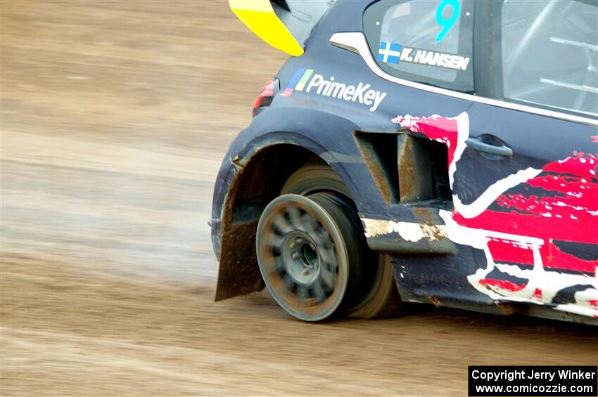 Kevin Hansen's Peugeot 208 loses a tire.