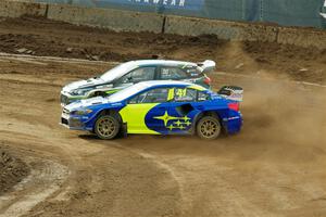 Scott Speed's Subaru WRX STi and Steve Arpin's Hyundai i20