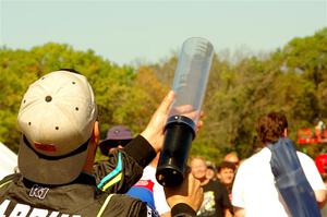 Steve Arpin shoots free t-shirts into the crowd.