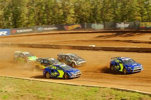 Five cars battle into the first turn during one of Sunday's heat races.