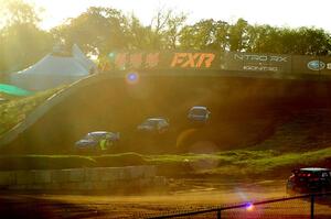 Scott Speed's Subaru WRX STi, and Kevin Hansen's Peugeot 208