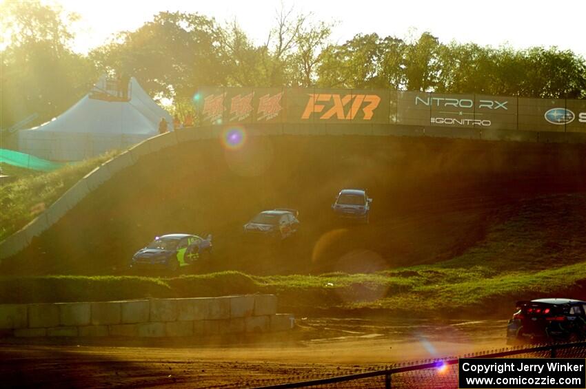 Scott Speed's Subaru WRX STi, and Kevin Hansen's Peugeot 208