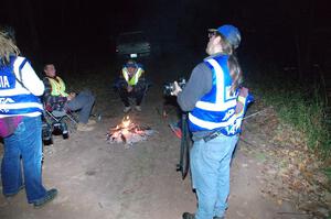 Photographers Kidril Durbin and Stan converse with marshals between runnings of the Bob Lake stages.