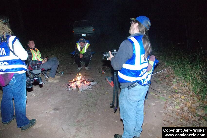 Photographers Kidril Durbin and Stan converse with marshals between runnings of the Bob Lake stages.