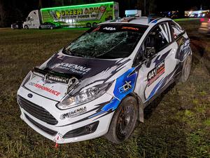 Al Kaumeheiwa / Phil Barnes Ford Fiesta at Sidnaw service after having a heavy roll after sunset.