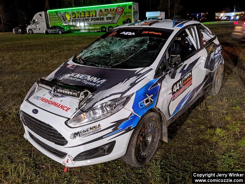 Al Kaumeheiwa / Phil Barnes Ford Fiesta at Sidnaw service after having a heavy roll after sunset.