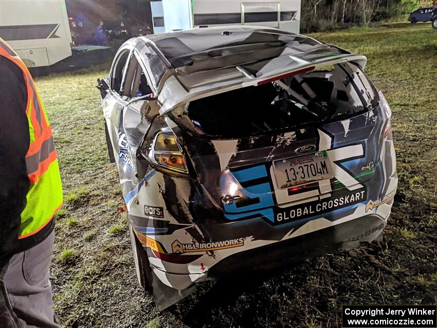 Al Kaumeheiwa / Phil Barnes Ford Fiesta at Sidnaw service after having a heavy roll after sunset.