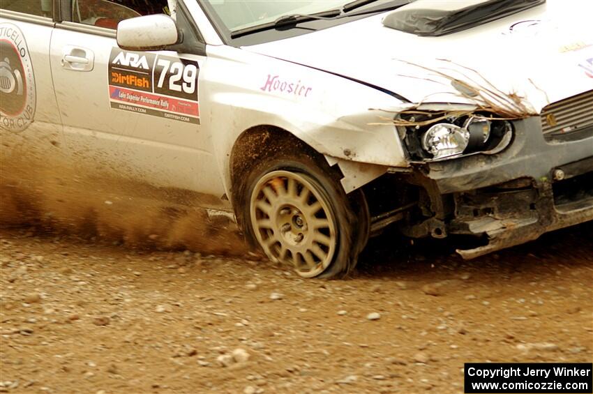 Dylan Murcott / Boyd Smith Subaru WRX STi limps through SS9, Silver-Arvon I, with a flat tire.