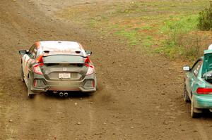 The Kyle Turner / Kevin Turner Subaru Impreza is passed by the John Sharps / Paul Hubers Honda Civic on SS9, Silver-Arvon I.