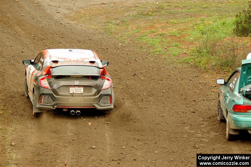 The Kyle Turner / Kevin Turner Subaru Impreza is passed by the John Sharps / Paul Hubers Honda Civic on SS9, Silver-Arvon I.