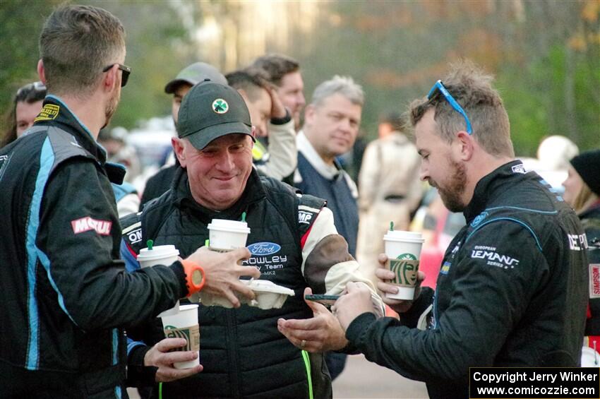 Tim Whitteridge, Paul Rowley and Kyle Tilley have coffee and tea delivered prior to the start of SS14, Mount Marquette.