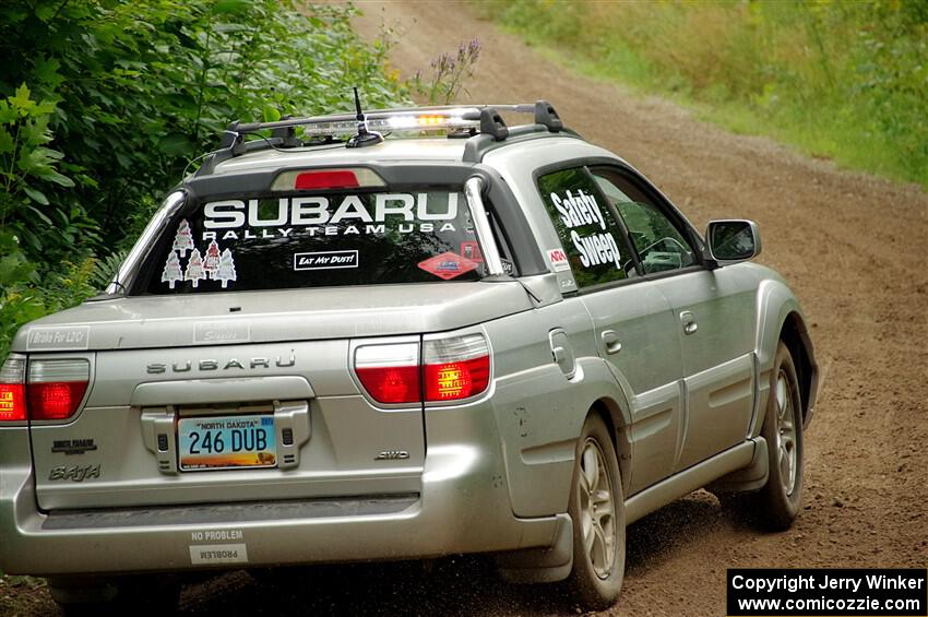 A Subaru Baja sweeps SS1, Crossroads I.