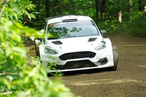 Allen Dobasu / Patrick Walsh Ford Fiesta shreds a left-front tire on SS5, Crossroads II.