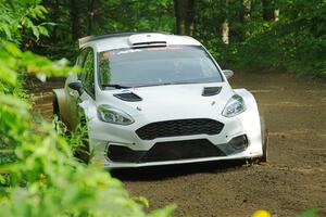 Allen Dobasu / Patrick Walsh Ford Fiesta shreds a left-front tire on SS5, Crossroads II.