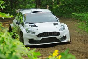 Allen Dobasu / Patrick Walsh Ford Fiesta shreds a left-front tire on SS5, Crossroads II.