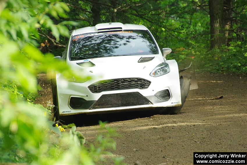 Allen Dobasu / Patrick Walsh Ford Fiesta shreds a left-front tire on SS5, Crossroads II.