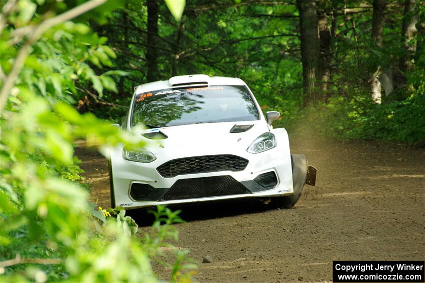 Allen Dobasu / Patrick Walsh Ford Fiesta shreds a left-front tire on SS5, Crossroads II.