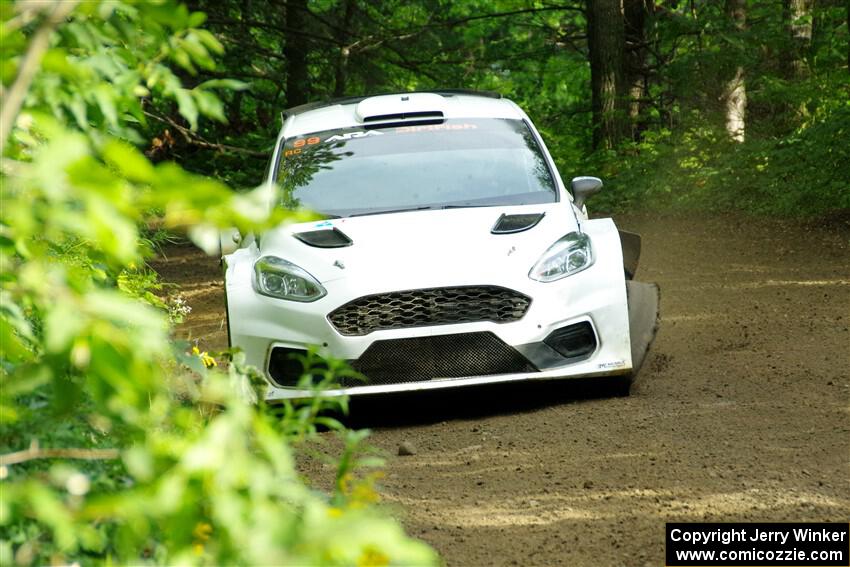 Allen Dobasu / Patrick Walsh Ford Fiesta shreds a left-front tire on SS5, Crossroads II.