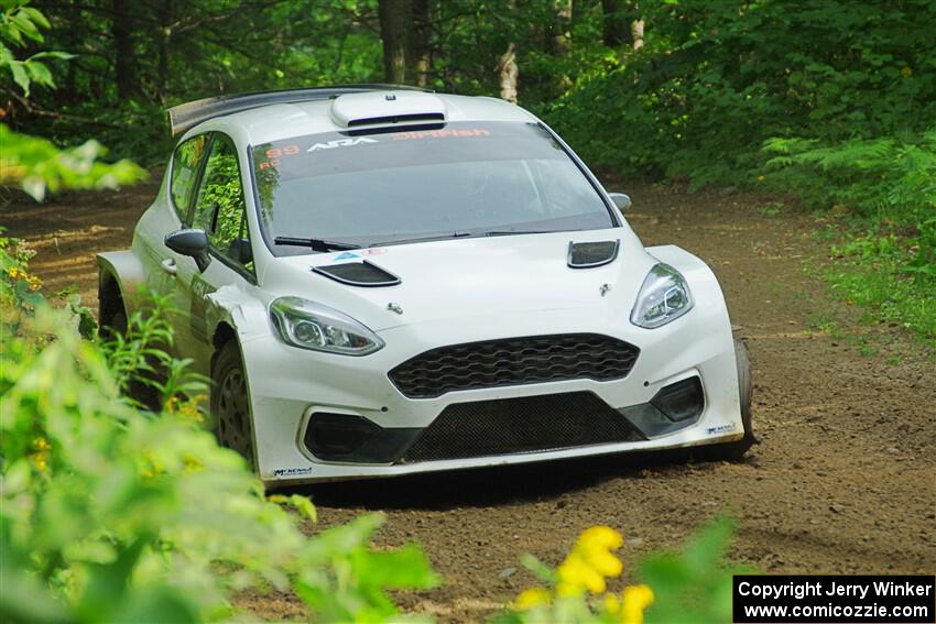 Allen Dobasu / Patrick Walsh Ford Fiesta shreds a left-front tire on SS5, Crossroads II.