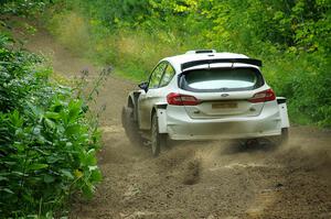 Allen Dobasu / Patrick Walsh Ford Fiesta shreds a left-front tire on SS5, Crossroads II.