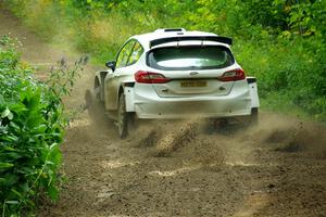 Allen Dobasu / Patrick Walsh Ford Fiesta shreds a left-front tire on SS5, Crossroads II.