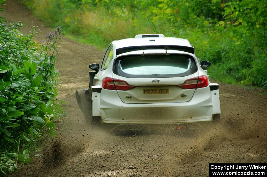 Allen Dobasu / Patrick Walsh Ford Fiesta shreds a left-front tire on SS5, Crossroads II.