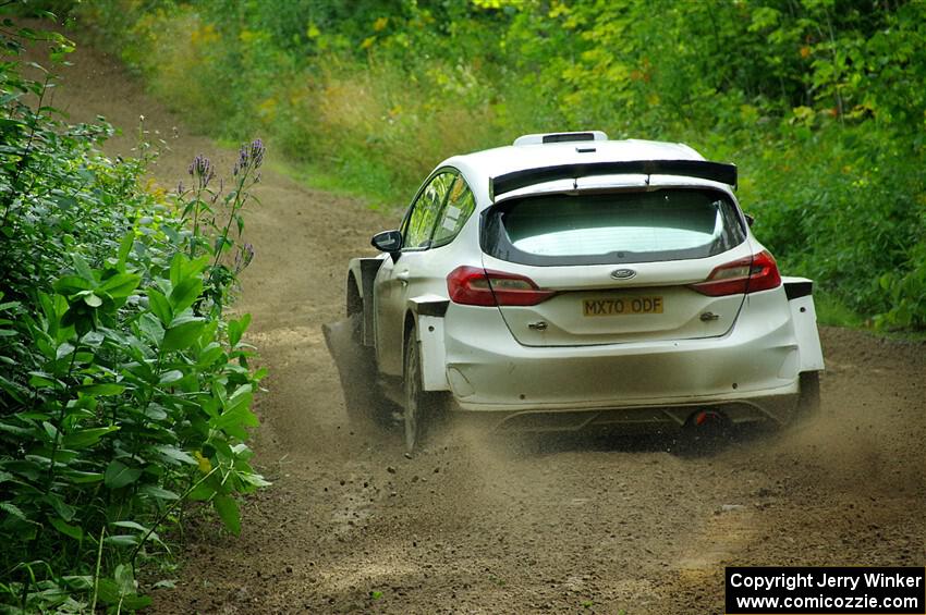 Allen Dobasu / Patrick Walsh Ford Fiesta shreds a left-front tire on SS5, Crossroads II.