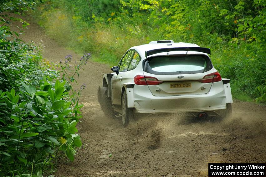 Allen Dobasu / Patrick Walsh Ford Fiesta shreds a left-front tire on SS5, Crossroads II.