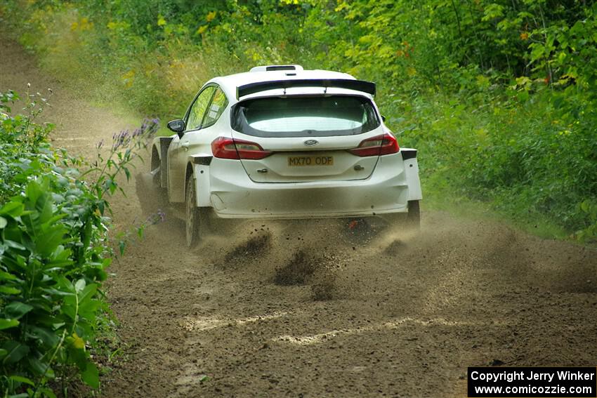 Allen Dobasu / Patrick Walsh Ford Fiesta shreds a left-front tire on SS5, Crossroads II.