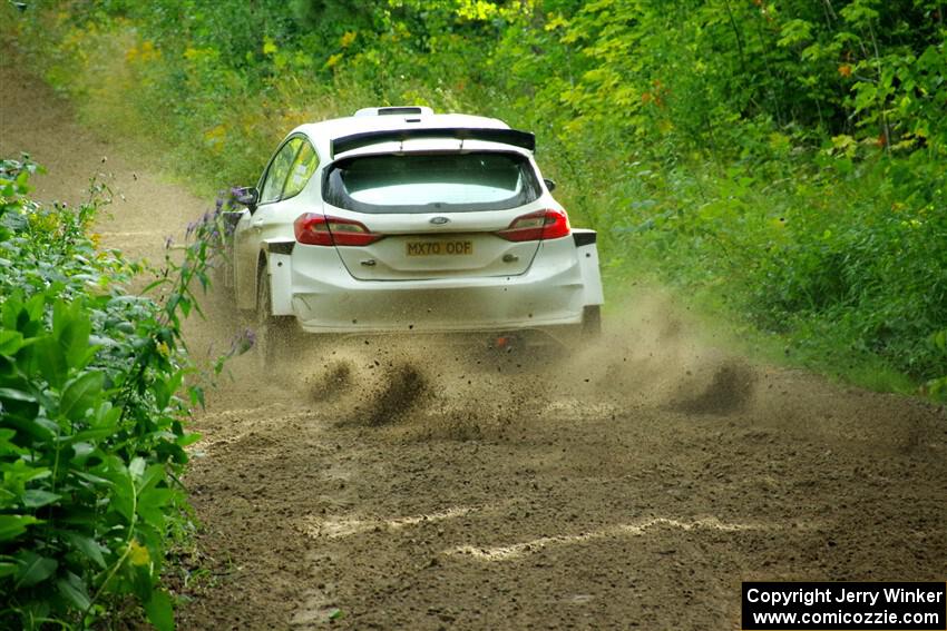 Allen Dobasu / Patrick Walsh Ford Fiesta shreds a left-front tire on SS5, Crossroads II.