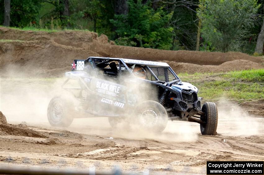 Terry Madden's Can-Am Maverick X3 snaps the front suspension and limps off the track.