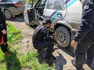 Micah Nickelson / Tyler Ptacek VW Golf change a tire prior to SS12, Height o' Land II.