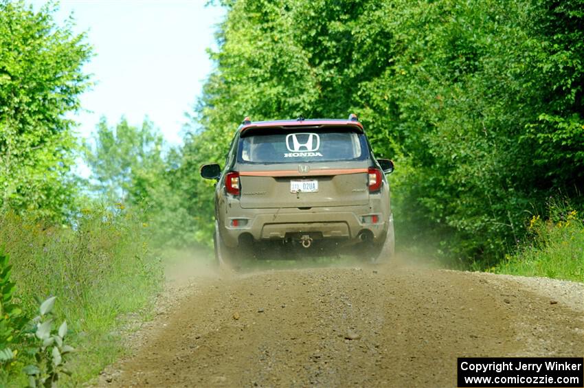 Chris Sladek / John Sharps Honda Passport on SS12, Height o' Land II.