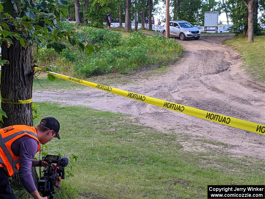 An advance car checks on SS14, Soo Pass East I.