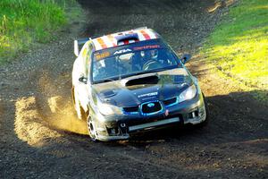 Matt James / Jackie James Subaru Impreza limps through SS16, Soo Pass East II, with a right-front flat.