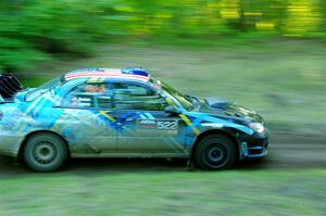 Matt James / Jackie James Subaru Impreza limps through SS16, Soo Pass East II, with a right-front flat.