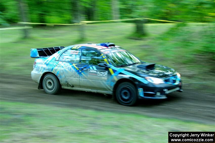 Matt James / Jackie James Subaru Impreza limps through SS16, Soo Pass East II, with a right-front flat.