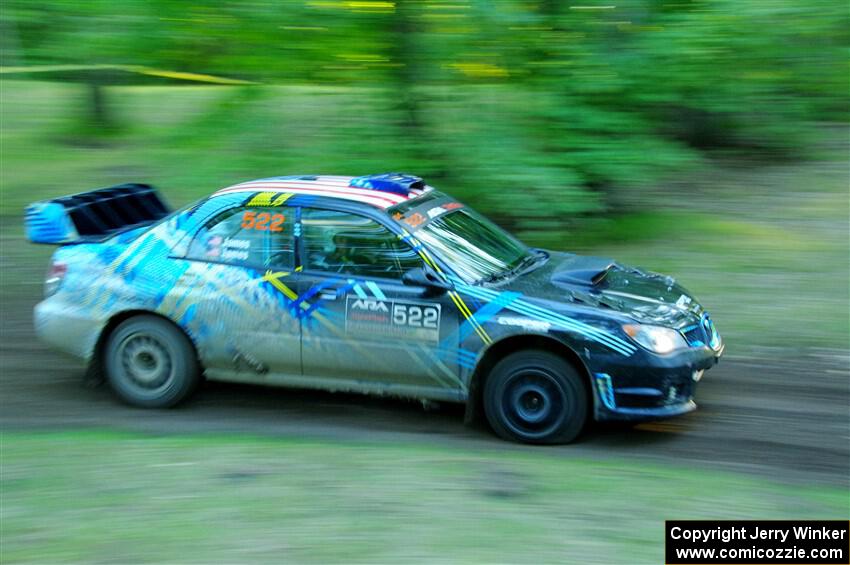 Matt James / Jackie James Subaru Impreza limps through SS16, Soo Pass East II, with a right-front flat.