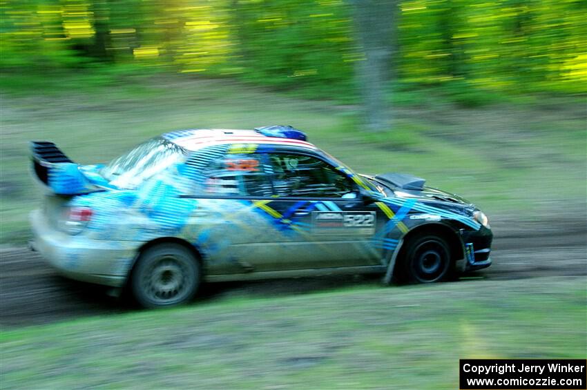 Matt James / Jackie James Subaru Impreza limps through SS16, Soo Pass East II, with a right-front flat.