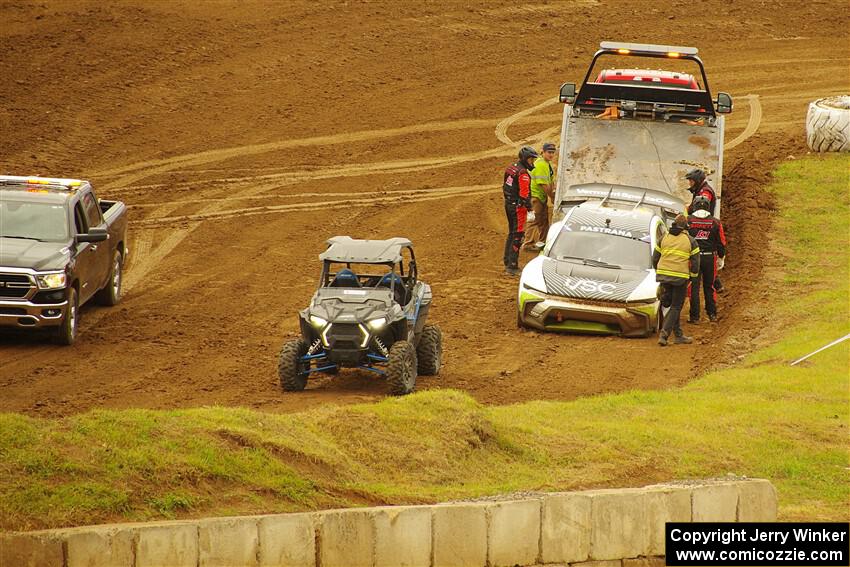 Travis Pastrana's FC1-X goes onto the flatbed.