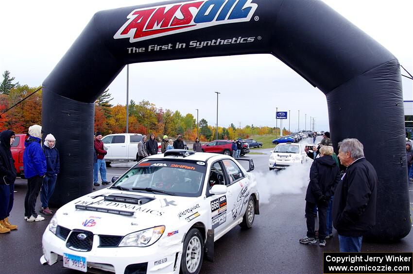 Pete Schaefer / Kevin Dobrowolski Subaru Impreza 2.5i leaves the ceremonial start.