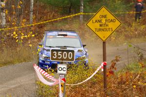 Travis Pastrana / Rhianon Gelsomino Subaru WRX STi on SS1, Passmore North I.