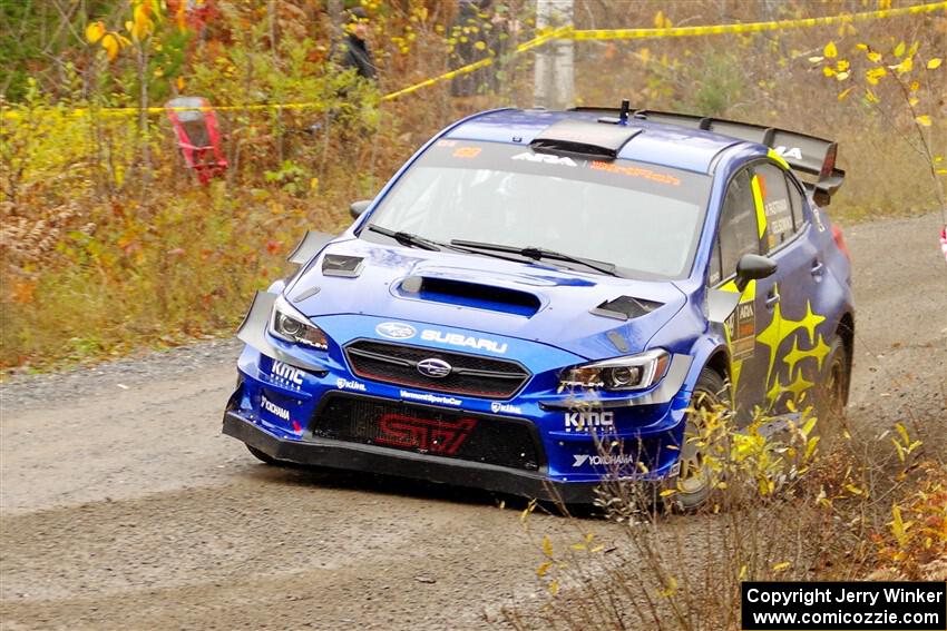 Travis Pastrana / Rhianon Gelsomino Subaru WRX STi on SS1, Passmore North I.